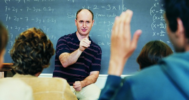 male professor calling on student
