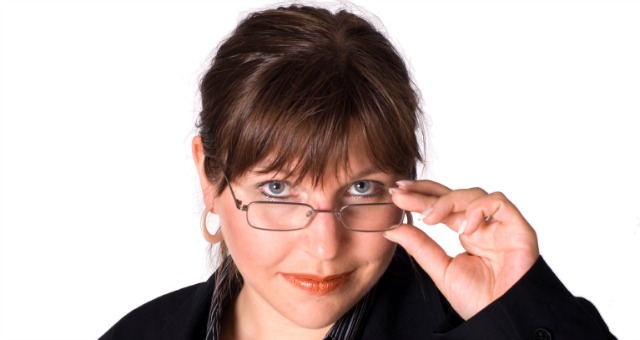 female professor looking over glasses