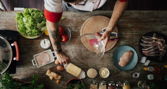 Chef lays out ingredients and starts mixing them