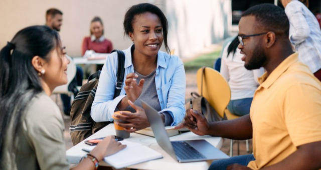 Group of student discussing at college campus