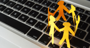 Keyboard with a paper people chain