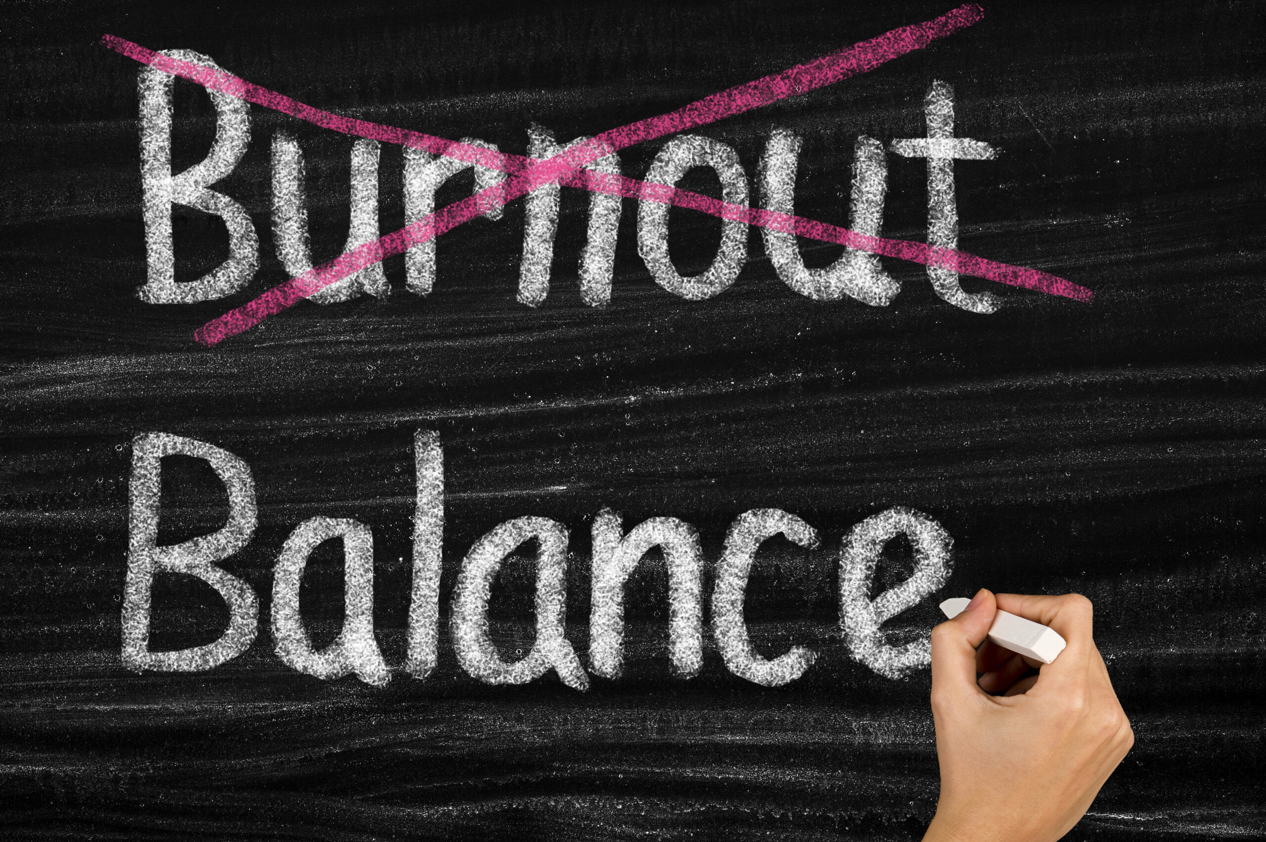 Work life balance concept on blackboard. educator burnout.